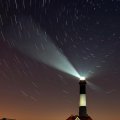 lighthouse under the stars
