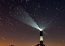lighthouse under the stars