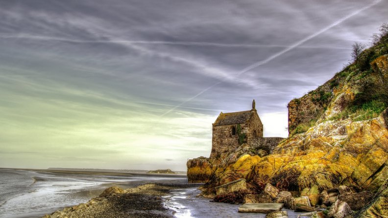 old stone church on a rocky seashore hdr