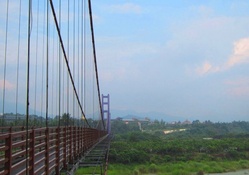 Long purple suspension bridge
