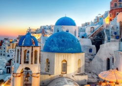 blue domed church on a greek isle