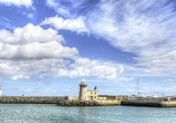 howth harbor lighthouse in dublin  ireland