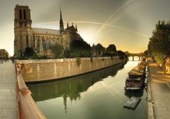 notre dame cathedral by the seine river