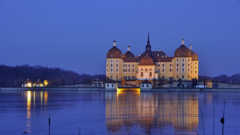 moritzburg castle in germany by a river