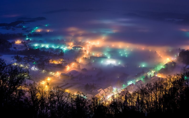 town_at_night_under_winter_fog.jpg