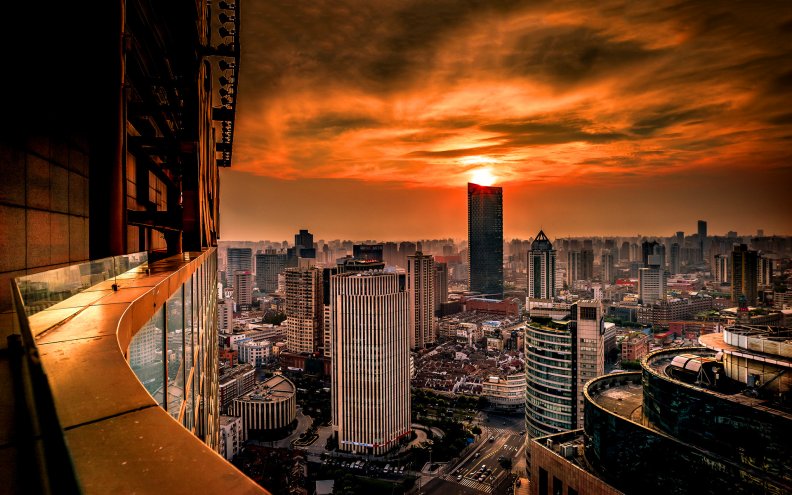 skyscraper view of shanghai at sunset