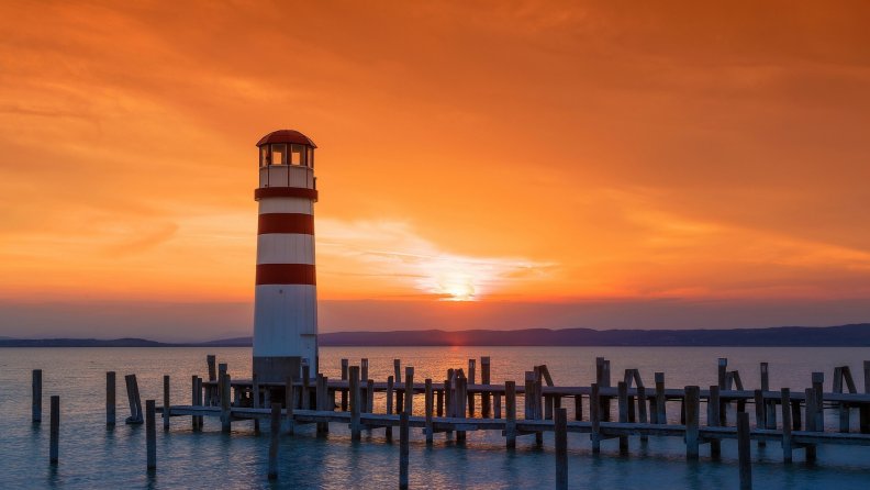 lighthouse on lake neusiedl austia at sunset