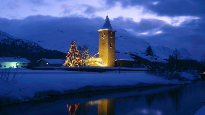 lighted_church_in_a_town_in_switzerland.jpg