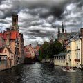 canal in stormy bruges belgium