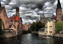canal in stormy bruges belgium