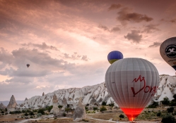 balloons over rock formations in bulgaria