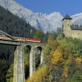 train bridge to a castle in austrian alps