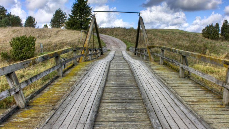nice countryside wooden bridge in finland hdr