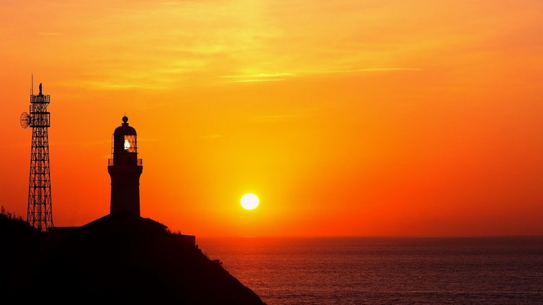 lighthouse at a magnificent sunset