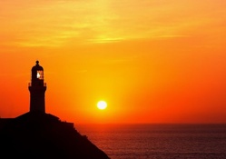 lighthouse at a magnificent sunset