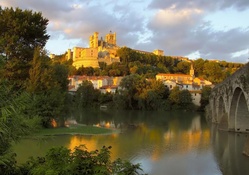 beautiful french castle on a hill in sunset