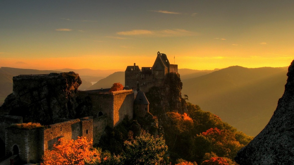 sunrise on ancient austrian castle