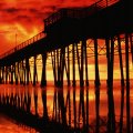 fiery sky over pier in san diego