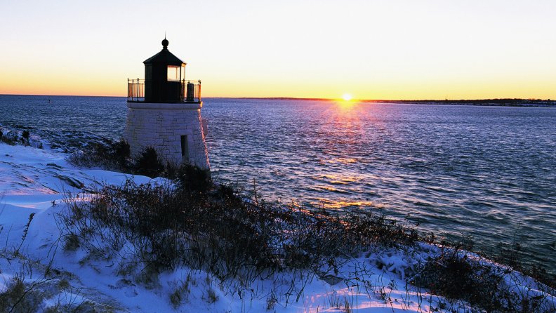 glorious lighthouse sunset in winter