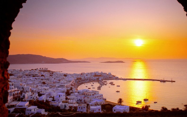 beautiful seaside greek village at sunset