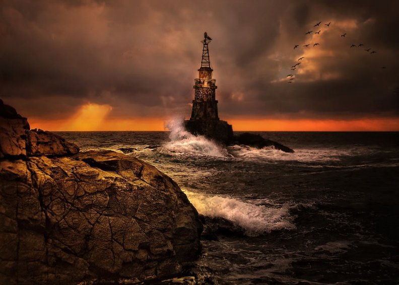 Lighthouse At Stormy Sea Download Hd Wallpapers And Free Images