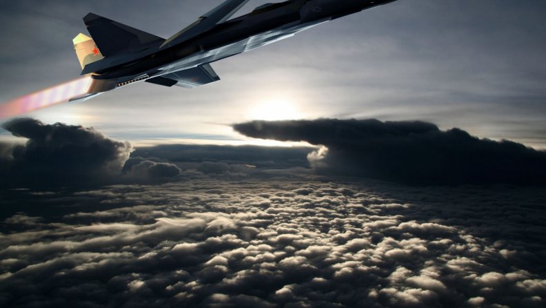 fighter_plane_over_cloud.jpg