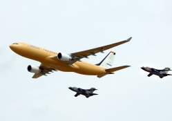 airbus a330 with two fighters