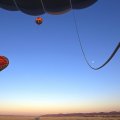 Hot Air Balloons Take Off at Sunrise Namib Desert Namibia.