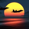 F_22 Raptors over sunset
