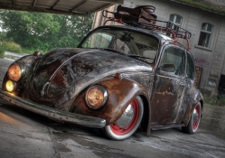 a well rusted vintage vw beetle