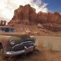 old buick at the end of the line in the desert