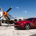 p51 and ford mustangs on the tarmac