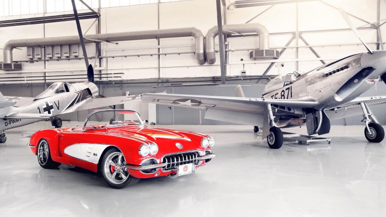 58_corvette_with_wwii_planes_in_background.jpg
