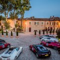 several million dollars of bugatti at a villa