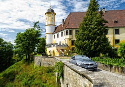 BMW leaving a monastery