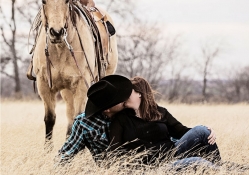 Kissing Cowgirl