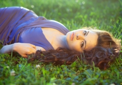 beauty lying on grass
