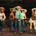 a chorus line of cowgirls