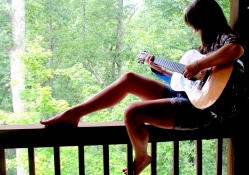 Cowgirl Playing Guitar