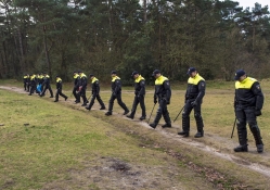 Dutch Policemen Searching for Evidence 01