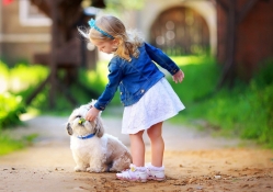 cute little girl with a white dog
