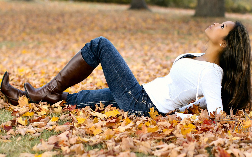 Autumn Cowgirl In Leaves