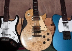 strat, 81 gibson, and tele