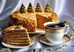 A cup of coffee and a slice of cake