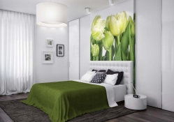 White bedroom with a green touch
