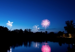 fireworks reflected in water