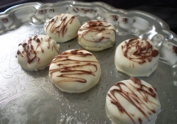 White cookies with chocolate syrup