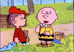 charlie brown with linus, she loves me, she loves me not