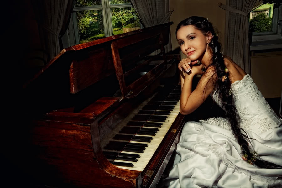Piano and beautiful girl
