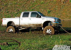 FORD F250 PICKUP STUCK IN THE MUD
